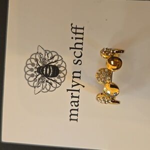 Marlyn Schiff Disc Pave Adjustable Ring. Gold tone